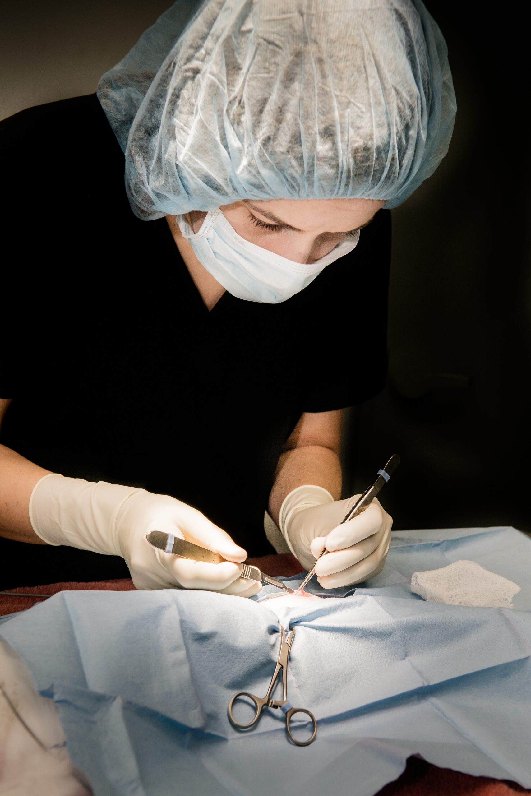 woman doing surgery